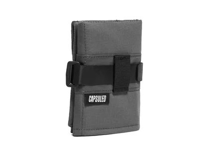 Capsuled Taška na cyklistické príslušenstvo Utility Bag Volcanic Ash, Čierna/Hnedá