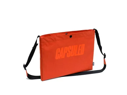 Capsuled Crossbody taška Musette Bag 3 l Orange Rust, Žltá/Červená