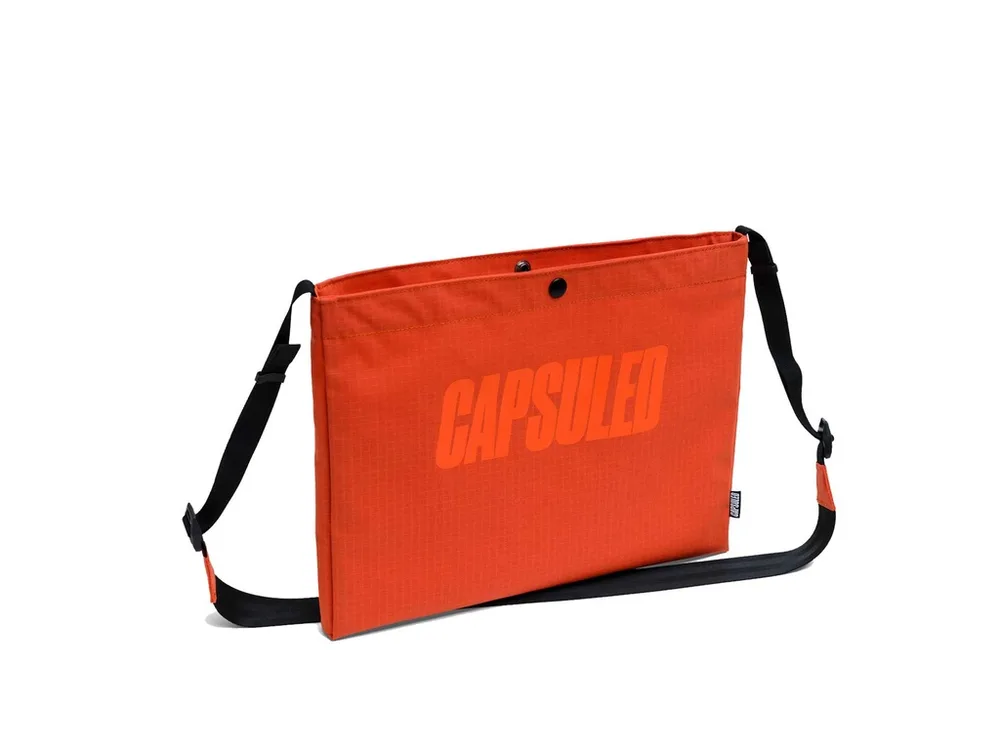 Capsuled Crossbody taška Musette Bag 3 l Orange Rust, Žltá/Červená